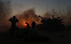 IDF Artillery Corps seen firing shells into Gaza, near the border in Southern Israel on July 21, 2014 (Photo credit: Yonatan Sindel/Flash90)