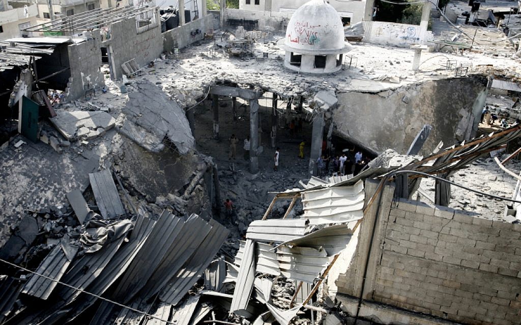Illustrative. Palestinians inspect the destruction in Farouq Mosque after it was hit in an Israeli airstrike in Rafah, southern Gaza Strip on July 22, 2014. (Abed Rahim Khatib/Flash90)