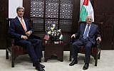 US Secretary of State John Kerry (left) speaks with Palestinian Authority President Mahmoud Abbas (right), on Wednesday, July 23, 2014. (photo credit: Issam Rimawi/Flash90)
