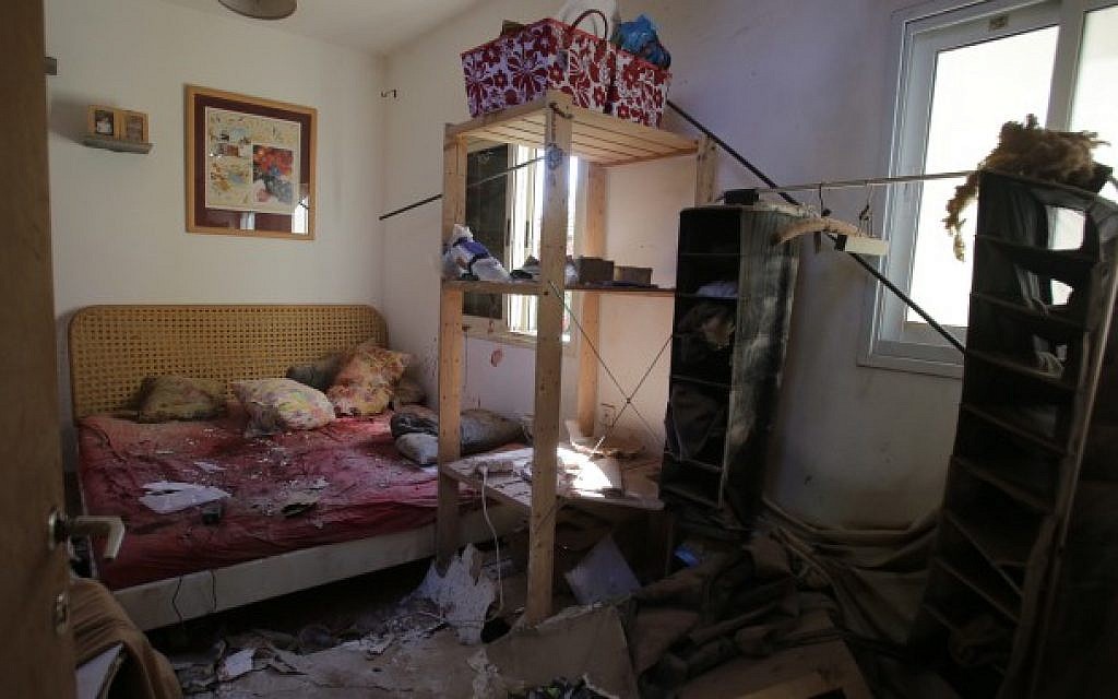 The damage caused to a house after it was hit by a rocket in Nahal Oz, on the border with the Gaza Strip on July 27, 2014, (Photo credit: Edi Israel/Flash90
