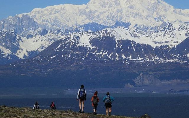 Liam Ferguson, center, who is moving to Israel with his parents, hikes along Alaska’s Kesugi Ridge with his sister, Zoey, left, and a family friend (photo credit: Stewart Ferguson)