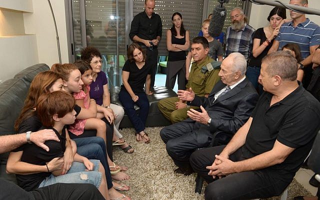 President Shimon Peres at the home of slain IDF soldier Amotz Greenberg (photo credit: Courtesy)