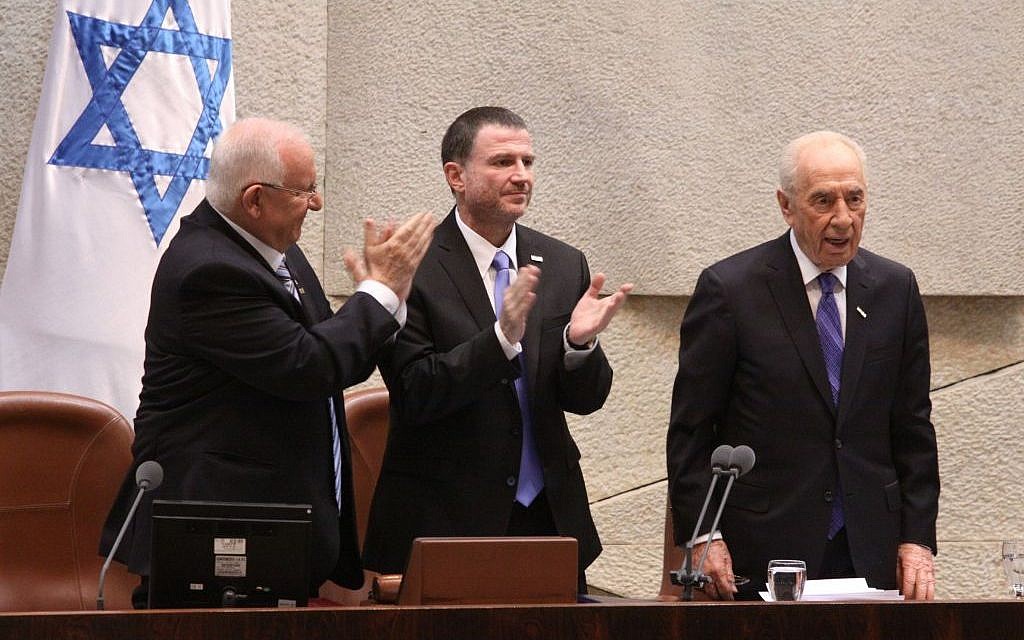 Incoming president Reuven Rivlin and Knesset Speaker MK Yuli Edelstein applaud outgoing President Shimon Peres at Rivlin's swearing in ceremony in Jerusalem, Thursday, July 24, 2014 (photo credit: Knesset Press Office)