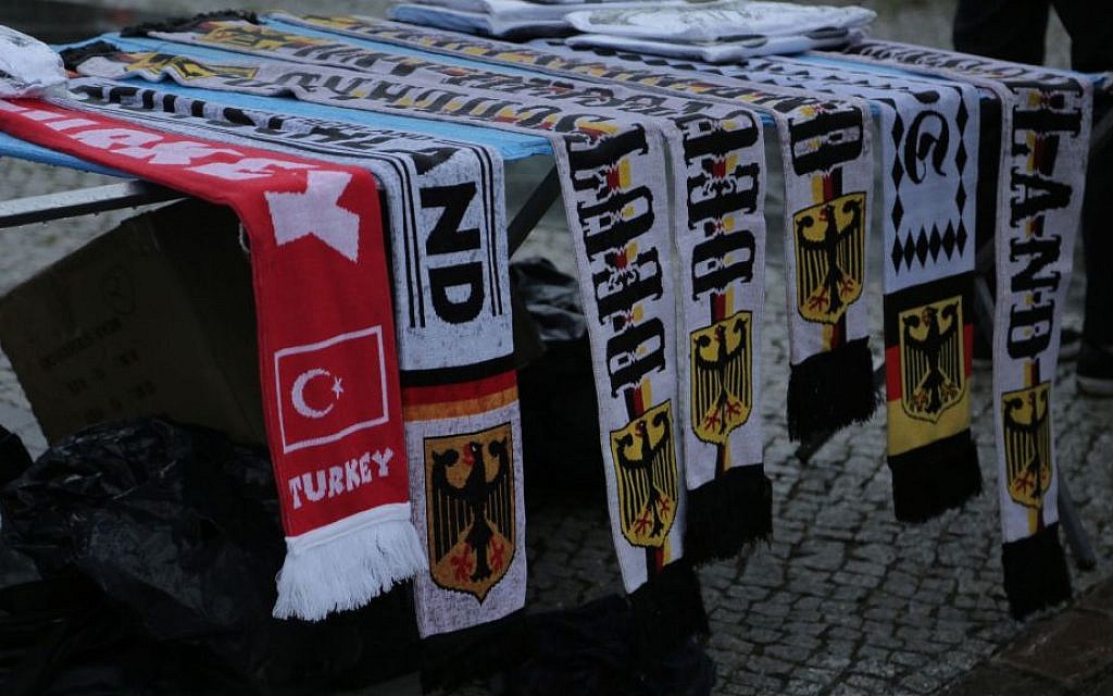 Turkish national team scarf among the World Cup paraphernalia for sale in Berlin, July 13, 2014. (Micki Weinberg/The Times of Israel)