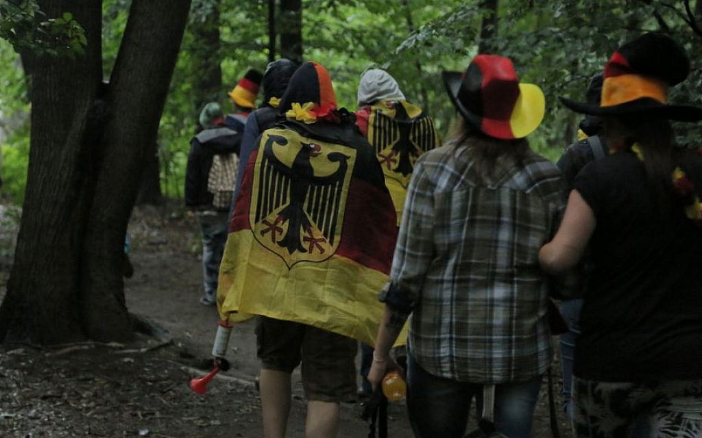 Fans on their way to the festival space to watch the World Cup final, July 13, 2014. (Micki Weinberg/The Times of Israel)