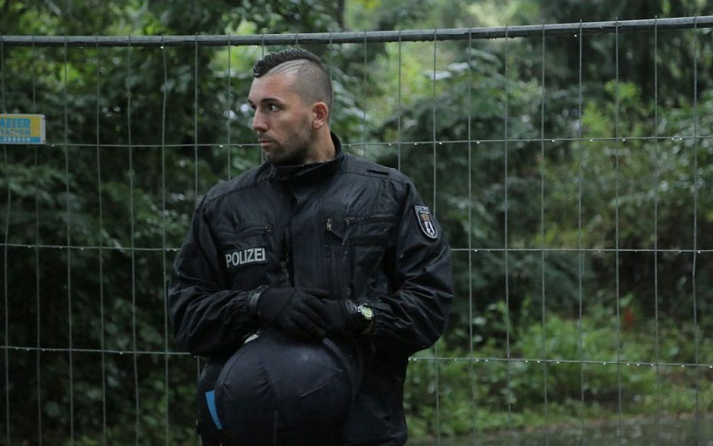 Police in the Tiergarten, near the official broadcasting/festival space in Berlin, July 13, 2014. (Micki Weinberg/The Times of Israel)