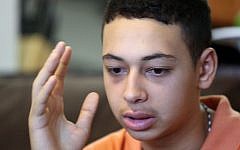 Tariq Abu Khdeir, 15, speaks during an interview at his home in Tampa, Florida, on July 20, 2014. (photo credit: AP/Scott Iskowitz)