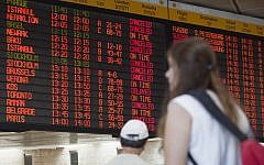 A departure flight board displays various canceled and delayed flights in Ben-Gurion International Airport, July 23, 2014. (AP/Dan Balilty)