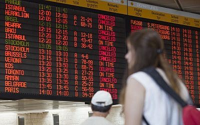 A departure flight board displays various canceled and delayed flights in Ben-Gurion International Airport, July 23, 2014. (AP/Dan Balilty)