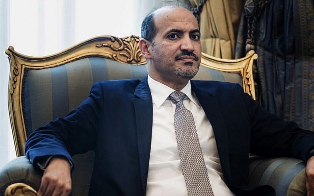 Syrian opposition leader President Ahmad al-Jarba waits for a meeting with U.S. Secretary of State John Kerry at King Abdulaziz International Airport in Jeddah, Saudi Arabia, Friday, June 27, 2014. (photo credit: AP Photo/Brendan Smialowski, Pool) Syrian opposition leader President Ahmad al-Jarba waits for a meeting with U.S. Secretary of State John Kerry at King Abdulaziz International Airport in Jeddah, Saudi Arabia, Friday, June 27, 2014. (photo credit: AP Photo/Brendan Smialowski, Pool)