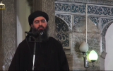 'Caliph' Abu Bakr al-Baghdadi speaks to Muslims in a mosque in Mosul, Iraq. (YouTube screen capture)