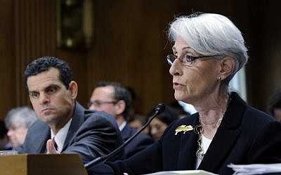 Undersecretary of State for Political Affairs Wendy Sherman, right, accompanied by Treasury Undersecretary For Terrorism And Financial Intelligence David Cohen, testifies on Capitol Hill in Washington, Tuesday, July 29, 2014, before the Senate Foreign Relations Committee hearing on Iran. (AP Photo/Susan Walsh)