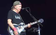Rocker Neil Young, performing at Hyde Park in London on July 12, is a longtime activist, engaged in a number of humanitarian efforts (Courtesy YouTube screen grab)