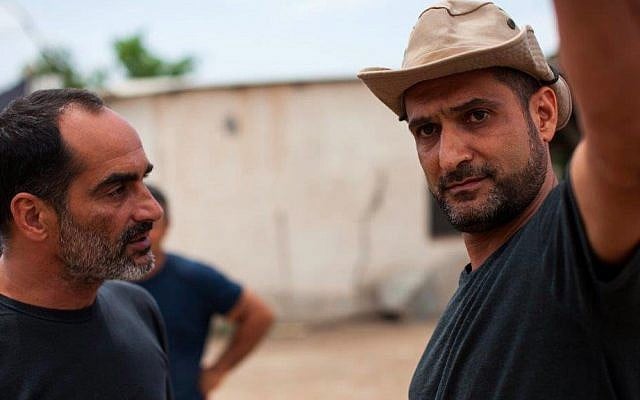 Yuval Delshad, right, gives Navid Negahban, left, direction on the set of the award-winning "Baba Joon." (Yoray Liberman) Yuval Delshad, right, gives Navid Negahban, left, direction on the set of the award-winning "Baba Joon." (Yoray Liberman)