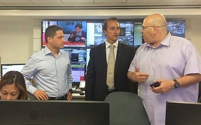 Mayor Ruvik Danilovich, Ambassador Dave Sharma and Amit Rayngold, deputy manager of the department of general administration, in a bunker in Beersheba, July 15, 2014. (Photo credit: Courtesy of the Australian embassy)