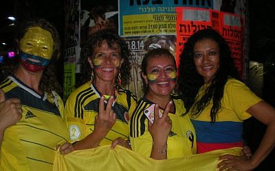 Colombians in Israel celebrate on Tel Aviv's Allenby Street after Colombia's victory over Uruguay. (photo credit: JTA/Diego Melamed)