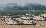 Israeli tanks seen near the Gaza border in southern Israel, on the second day of Operation Protective Edge, July 9, 2014. (photo credit: Yonatan Sindel/Flash90)