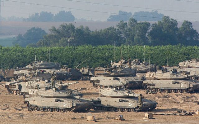 Israeli tanks seen near the Gaza border in southern Israel, on the second day of Operation Protective Edge, July 9, 2014. (photo credit: Yonatan Sindel/Flash90) Israeli tanks seen near the Gaza border in southern Israel, on the second day of Operation Protective Edge, July 9, 2014. (photo credit: Yonatan Sindel/Flash90)
