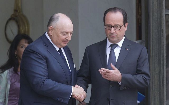 French President Francois Hollande, right, bids farewell to President of the European Jewish Congress Moshe Kantor, left, after a meeting at the Elysee Palace in Paris, Tuesday, July 8, 2014. (AP Photo/Michel Euler) French President Francois Hollande, right, bids farewell to President of the European Jewish Congress Moshe Kantor, left, after a meeting at the Elysee Palace in Paris, Tuesday, July 8, 2014. (AP Photo/Michel Euler)