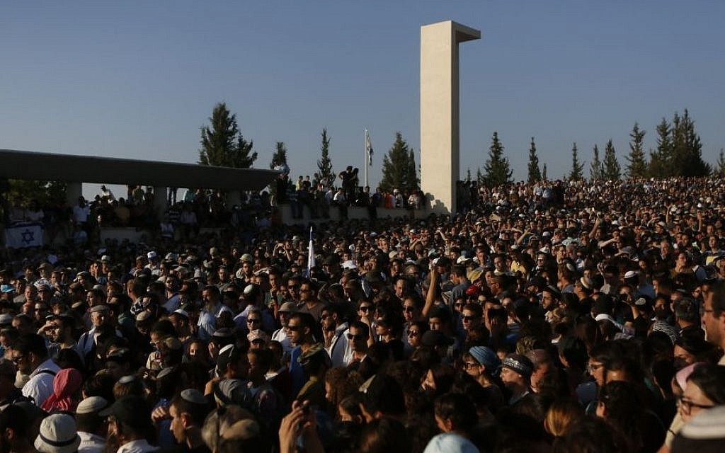 Thousands of people attend the joint funeral for the three murdered Jewish teens, in the Modiin cemetery, on July 1, 2014 (photo credit: Miriam Alster/Flash90)