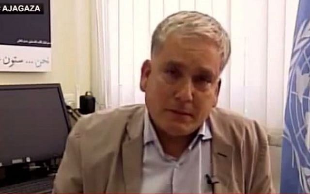 Chris Gunness, the UNRWA spokesman in Gaza, shortly before breaking into tears during a television interview during the 50-day summer conflict, July 30, 2014. (photo credit: screen capture YouTube/Kaya Bouma) Chris Gunness, the UNRWA spokesman in Gaza, shortly before breaking into tears during a television interview during the 50-day summer conflict, July 30, 2014. (photo credit: screen capture YouTube/Kaya Bouma)