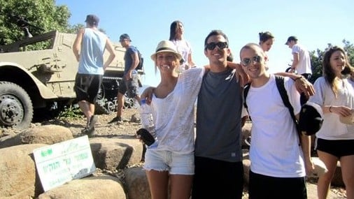 In this June 2012 photo courtesy of Stuart Steinberg, Max Steinberg, right, poses while on a trip to Israel with his siblings Paige Steinberg, left, and Jake Steinberg. (photo credit: AP Photo/Courtesy of Stuart Steinberg) In this June 2012 photo courtesy of Stuart Steinberg, Max Steinberg, right, poses while on a trip to Israel with his siblings Paige Steinberg, left, and Jake Steinberg. (photo credit: AP Photo/Courtesy of Stuart Steinberg)
