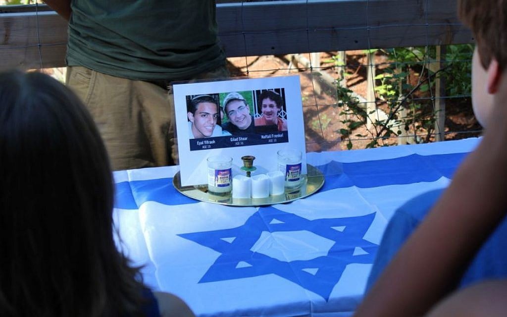 A memorial display paying tribute to the three murdered Israeli teens at Camp Solomon Schechter in Olympia, Wash. (Josh Niehaus/via JTA) A memorial display paying tribute to the three murdered Israeli teens at Camp Solomon Schechter in Olympia, Wash. (Josh Niehaus/via JTA)