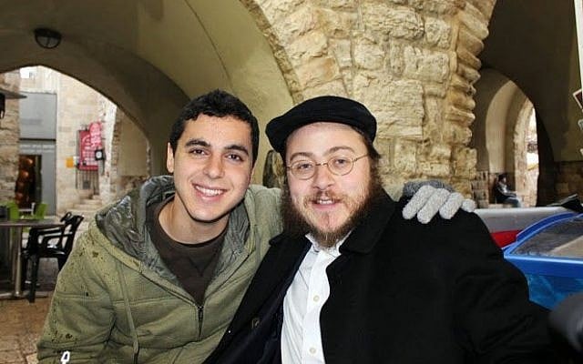 This 2012 photo provided by Rabbi Asher Hecht, shows Nissim Sean Carmeli, left, with Hecht in Jerusalem. (photo credit: AP Photo/Rabbi Asher Hecht via Chabad of the Rio Grande Valley) This 2012 photo provided by Rabbi Asher Hecht, shows Nissim Sean Carmeli, left, with Hecht in Jerusalem. (photo credit: AP Photo/Rabbi Asher Hecht via Chabad of the Rio Grande Valley)