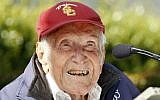 US Olympic distance runner and World War II veteran Louis Zamperini gestures during a news conference, in Pasadena, Calif. Zamperini, May 9, 2014. (photo credit: AP/Nick Ut)