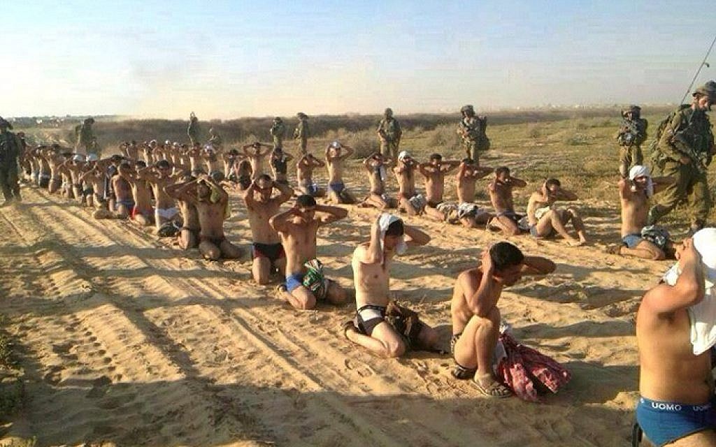 Gazan suspects are rounded up by IDF troops Wednesday, July 24, 2014