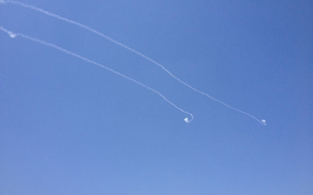 Two rockets being shot down over Sderot Thursday. (photo credit: Mitch Ginsburg/Times of Israel)