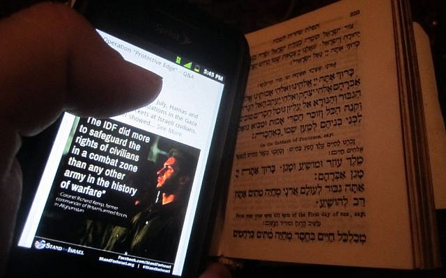 A Boston Jew mixes prayers with pro-Israel social media (photo credit: Matt Lebovic) A Boston Jew mixes prayers with pro-Israel social media (photo credit: Matt Lebovic)