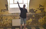 Adam Schoenberger at the new Budapest headquarters of Marom, the cultural organization he helped found. (Cnaan Liphshiz/JTA)
