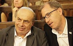 Jewish Agency Chairman Natan Sharansky, left, with the organization’s head of French operations, Ariel Kandel, at a Paris synagogue, July 2, 2014. (photo credit: JTA/Alain Azria)