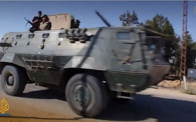 Egyptian armored vehicle in the Sinai Peninsula. (screen capture: YouTube/Al Jazeera English) Egyptian armored vehicle in the Sinai Peninsula. (screen capture: YouTube/Al Jazeera English)