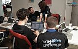 Tech Challenge participants working on a project (Photo credit: Courtesy)