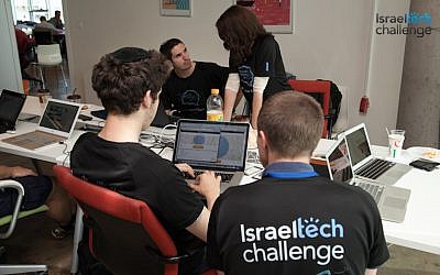 Tech Challenge participants working on a project (Photo credit: Courtesy)