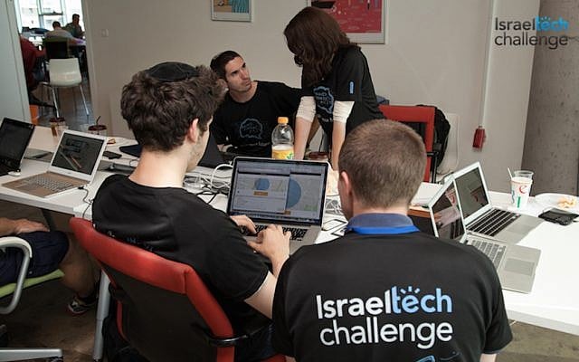 Tech Challenge participants working on a project (Photo credit: Courtesy)
