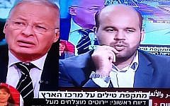 Channel 2's Ehud Yaari left) speaks to Hamas's Al-Aksa TV presenter, live on both stations (Channel 2 screenshot)