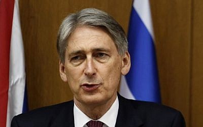 British Foreign Secretary Philip Hammond speaks during a joint press conference with Prime Minister Benjamin Netanyahu on July 24, 2014, at the Knesset. (photo credit:  AFP PHOTO/GALI TIBBON)
