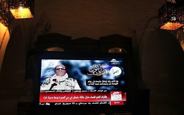 A television monitor displays the statement by Hamas spokesman Abu Obaida on Al Aqsa TV channel in Gaza City on August 20, 2014. photo credit: AFP/ THOMAS COEX) A television monitor displays the statement by Hamas spokesman Abu Obaida on Al Aqsa TV channel in Gaza City on August 20, 2014. photo credit: AFP/ THOMAS COEX)