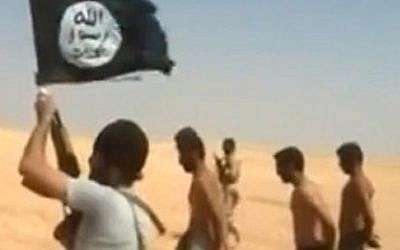 An image grab taken from a video uploaded on social networks on August 28, 2014, shows young men in underwear being marched barefoot along a desert road before being allegedly executed on August 27, 2014 by Islamic State (IS) militants at an undisclosed location in Syria's Raqa Province. Islamic State fighters have executed more than 160 Syrian soldiers it captured during its storming of the key northern Tabqa air base this week. AFP was unable to verify the location and the date of the video. (Photo credit:AFP / HO / YOUTUBE)
