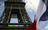 French flags next to the Eiffel Tower, in Paris, on August 19, 2014, mark the 70th anniversary of the liberation of France. (photo credit: AFP/Joel Saget)