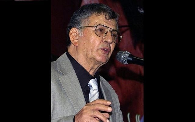 Druze poet Samih al-Qasim reads a poem during a literary evening marking 40 days since the death of his compatriot, Mahmoud Darwish, in Tunis, September 2008. Al-Qasim passed away on August 19, 2014, following a battle with cancer. (photo credit: Fethi Beladi/AFP) Druze poet Samih al-Qasim reads a poem during a literary evening marking 40 days since the death of his compatriot, Mahmoud Darwish, in Tunis, September 2008. Al-Qasim passed away on August 19, 2014, following a battle with cancer. (photo credit: Fethi Beladi/AFP)