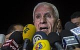 Azzam al-Ahmad gives a press conference at a hotel in Cairo, August 13, 2014. (photo credit: AFP/Khaled Desouki)
