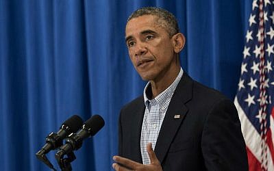 US President Barack Obama speaks on the situation in Iraq at Martha's Vineyard, Massachusetts, on August 14, 2014 (photo credit: AFP/Nicholas KAMM)