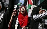 Protesters march as they take part in a demonstration against military action in Gaza on August 9, 2014 in New York City (photo credit: Kena Betancur/Getty Images/AFP)