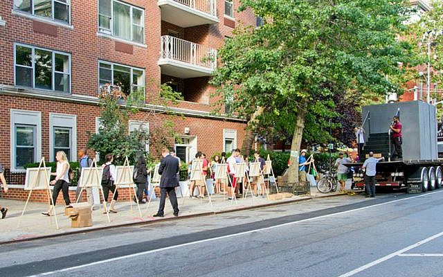 The organizers of 'Art Vigil' set up easels along a busy walkway in New York's Village. (courtesy)