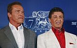 Arnold Schwarzenegger and Sylvester Stallone pose on the red carpet for the premiere of their movie "The Expendables 3" in Macau, China, Friday, Aug. 22, 2014. The two are among 187 signatories on a new letter slamming Hamas. (photo credit: AP Photo/Kin Cheung)