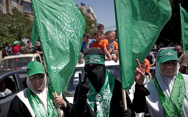 Palestinian Hamas supporters gather for a rally in Gaza City, August 7, 2014 (photo credit: AP/Khalil Hamra) Palestinian Hamas supporters gather for a rally in Gaza City, August 7, 2014 (photo credit: AP/Khalil Hamra)